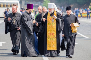 Parishioners Ukrainian Orthodox Church Moscow Patriarchate during religious procession. Kiev, Ukraine clipart