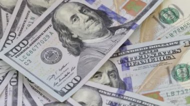 Rotation paper money . Background with money american hundred dollar bills