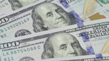 Rotation paper money . Background with money american hundred dollar bills