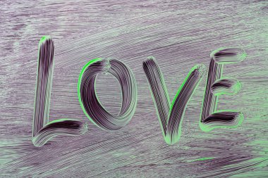 Boyalı yeşil camlara yazıt aşkını çiziyorum. Kapat.