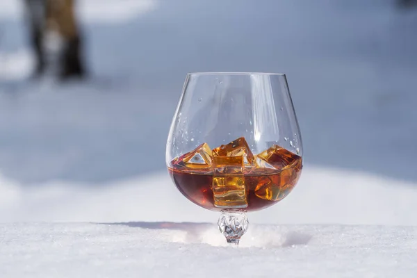 Glass Cognac Ice Bed Snow White Background Close Concept Christmas — Stock Photo, Image