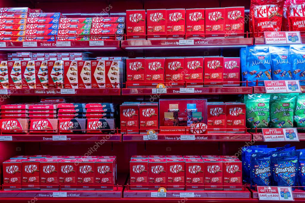Muscat, Oman - january 19, 2020 : Kit Kat chocolates and other sweets on a shelf at the duty-free shop at the Muscat international airport, Oman