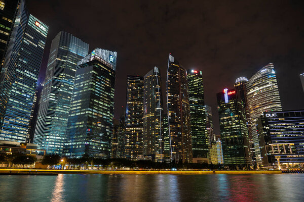Singapore city, Singapore - march 27, 2019 : Singapore Skyline and view of skyscrapers on Marina Bay at night . Singapore cityscape of the financial district