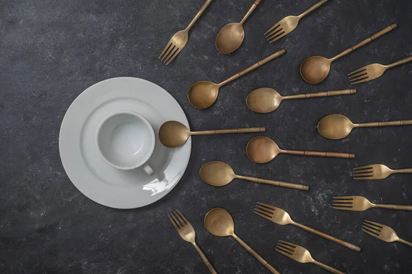 White Ceramic Plate Cup Brass Forks Spoons Look Sperm Competition — Stock Photo, Image