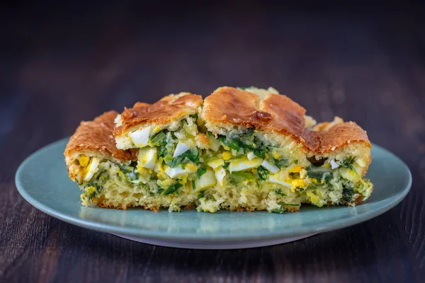 Pouring Pie Green Wild Garlic Leaves Boiled Eggs Wooden Table — Stock Photo, Image