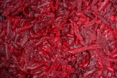 Salata için ızgara kırmızı pancar, yakın çekim. Pancar dilimi arka plan veya doku. Üst görünüm
