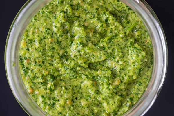 Green Pesto Sauce Glass Bowl Isolated Black Background Close Top — Stock Photo, Image