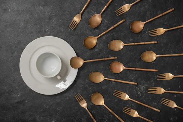 White Ceramic Plate Cup Brass Forks Spoons Look Sperm Competition — Stock Photo, Image