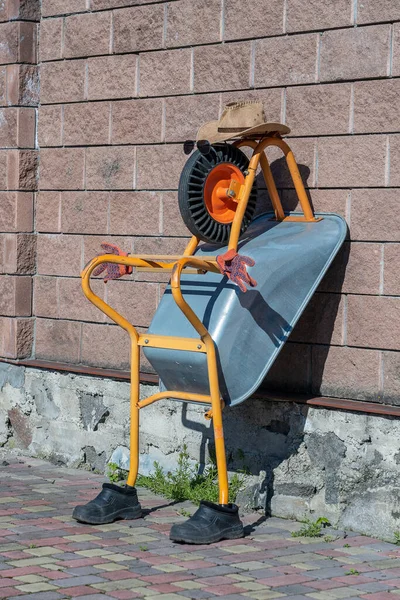 Old Funny Wheelbarrow Human Form Leaning Stone Fence Courtyard Rural — Stock Photo, Image