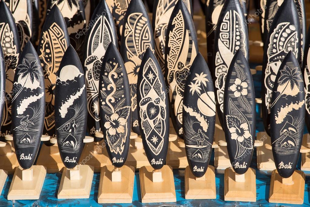 Souvenirs in the form of wooden surfboards in Bali — Stock Photo © OlegDoroshenko 65506601