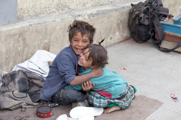 Beggar boy and girl in Leh, India