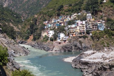 Devprayag is the last prayag of Alaknanda River and from this point the confluence of Alaknanda and Bhagirathi River is known as Ganga. Uttarakhand, India.  clipart