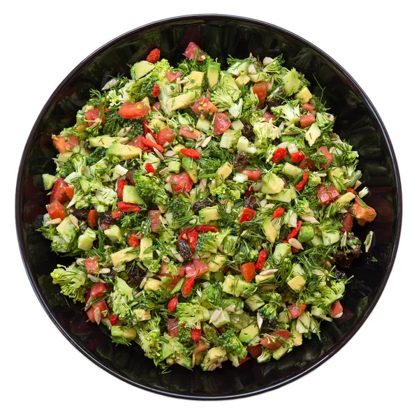 Salad with broccoli, red pepper, avocado, dill, raisins, sunflower seeds — Stock Photo, Image