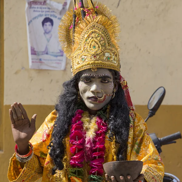 Indian sadhu in mythological clothing blesses the people on the street. Pushkar , India — Stock Photo, Image
