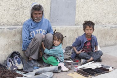 Poor family in Leh, India clipart