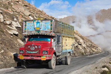 Truck on the high altitude Manali - Leh road , India  clipart