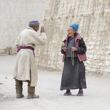 Tibetan Buddhist old woman and man in the monastery of Lamayuru, Ladakh, India