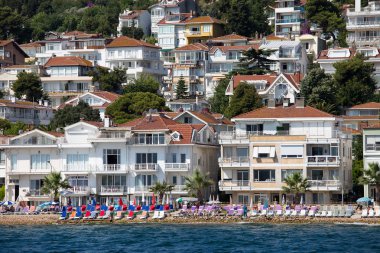 View of Princes Islands of Kinaliada hillside with luxury residential housing on coast, Turkey