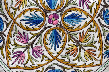 Kashmiri embroidered patterns on the carpet. Srinagar, India