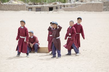Tibetan boys involved in sports .  Druk White Lotus School. Ladakh, India  clipart