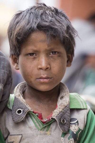 Portrait poor boy on the street in Leh, Ladakh. India