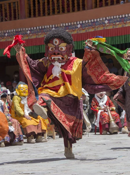 Tibetan Buddhist lamas in the mystical masks perform a ritual Tsam dance . Hemis monastery, Ladakh, India — Stock Photo, Image