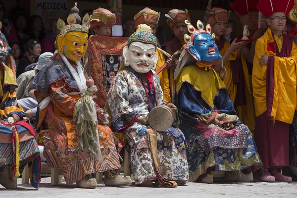 Tibetan Buddhist lamas in the mystical masks perform a ritual Tsam dance . Hemis monastery, Ladakh, India — Stock Photo, Image