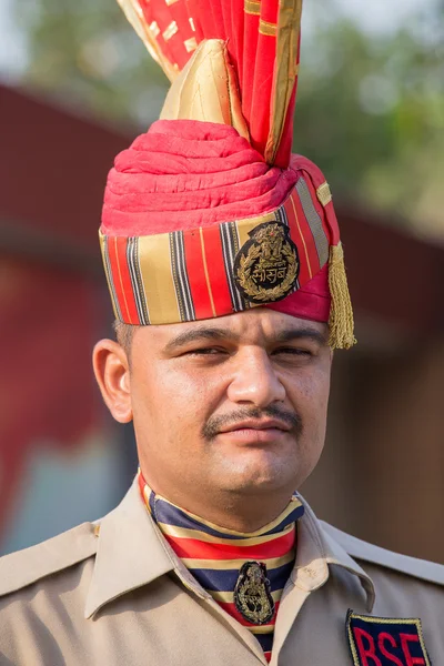 Portrait Indian frontier guard at the Indian - Pakistani border during the border closing ceremony. Attari, India — Stock Photo, Image