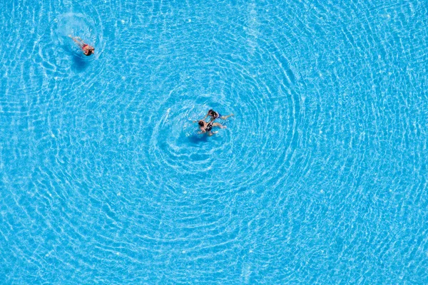 Aerial view of tourists swimming in the pool — Stock Photo, Image