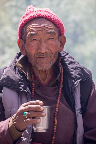 Tibetan Buddhist old men in Hemis monastery. Ladakh, North India