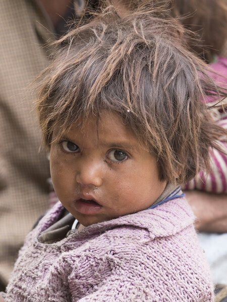 Portrait poor young girl in India