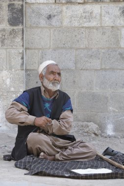 Beggar Indian man. Srinagar, Kashmir, India.