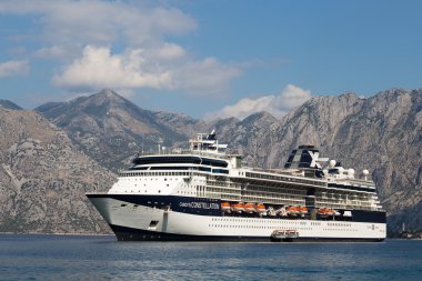 Large cruise ship Celebrity Constellation in Boka Kotorsky Bay. Montenegro clipart