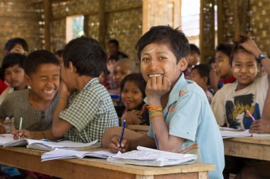 Burmese school children in a local school during the lesson. Mrauk U, Myanmar