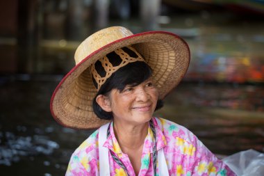 Portrait Thai woman in Taling Chan Floating Market. Bangkok, Thailand
