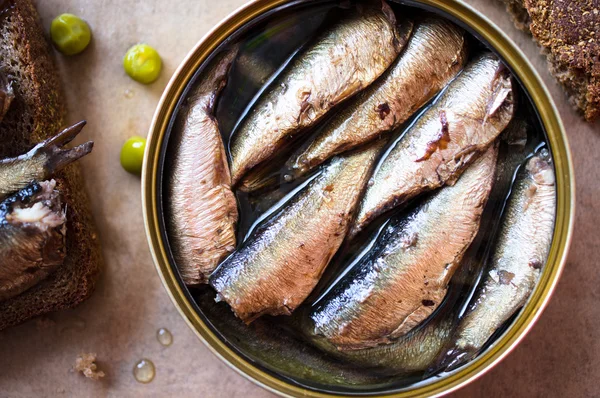 Tin can of sprats, sardines — Stock Photo, Image