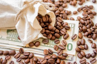 Coffee beans and dollars clipart