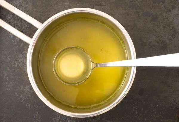 Broth in a saucepan — Stock Photo, Image