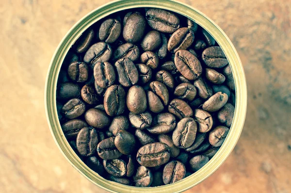 Coffee beans canned in tin top view — Stock Photo, Image