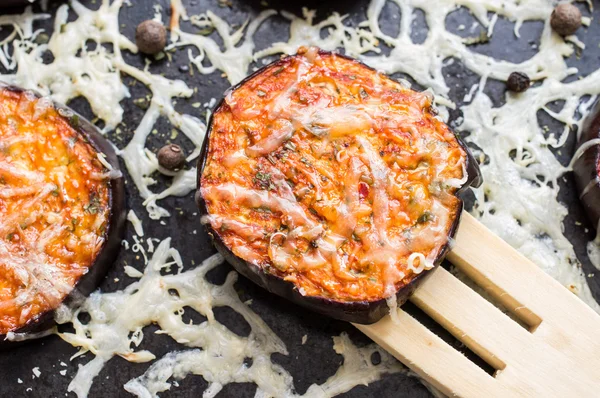 Wooden paddle with eggplant tapas — Stock Photo, Image