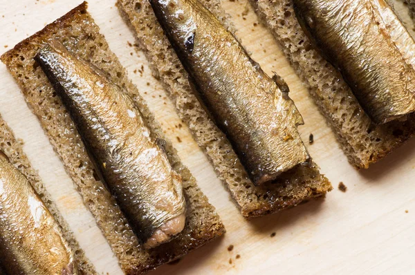 Bread with sprats closeup — Stock Photo, Image