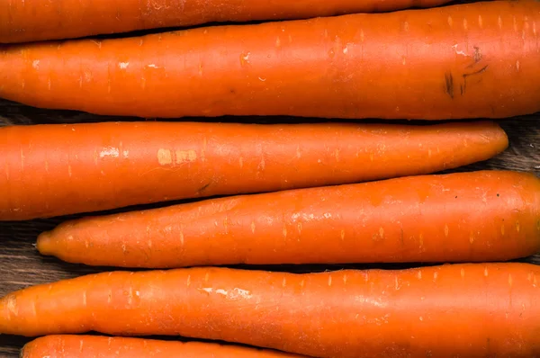 Las zanahorias son algunas piezas —  Fotos de Stock