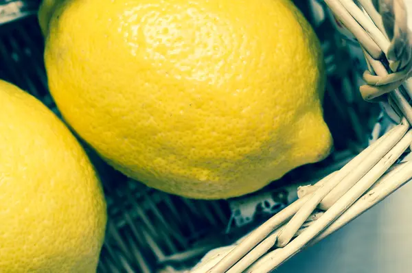 Lemon in basket view from above — Stock Photo, Image