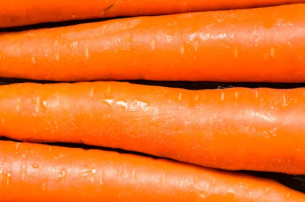Zanahorias frescas para el fondo la vista superior —  Fotos de Stock