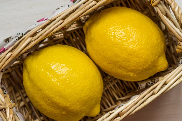 Two of lemon in a wicker basket — Stock Photo, Image