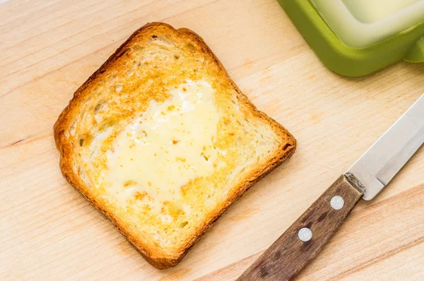 Sandwich mit Butter auf dem Tisch — Stockfoto