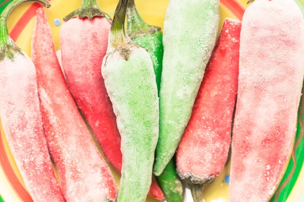 Frozen chilli peppers — Stock Photo, Image