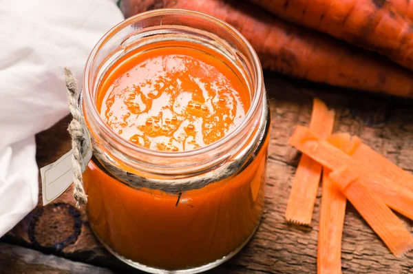 Carrot smoothie in a glass jar — Stock Photo, Image