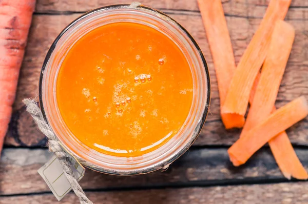 Carrot fresh juice in a glass jar — Stock Photo, Image