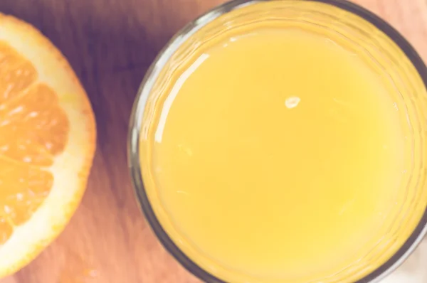 Orange juice glass top view — Stock Photo, Image